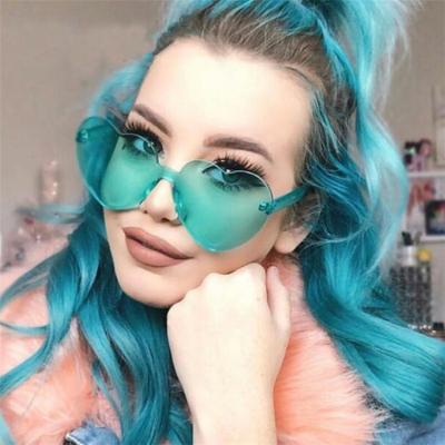 China Cute Fashion Heart Sun Glass Summer Shades Women Love Roses Designer Luxury Candy Rimless Women Sunglasses for sale