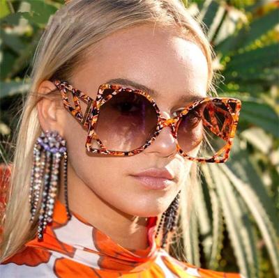 China Fashion Shades 2021 Fashion Sunglasses Vintage Colorful Lady Big Oversized Sun Glasses Girls Fun Hollow Out Cow Print Sunglasses For Women for sale