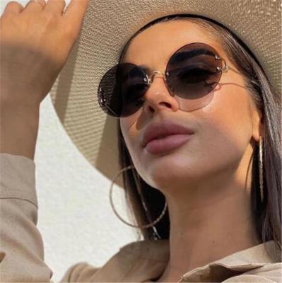 China Lady Latest Fashion Metal Luxury Oversized Retro Gradient Lens Sun Glasses Designer Rimless Sunglasses Shade 2021 Women for sale