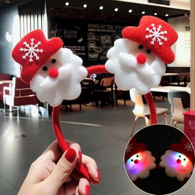 China New Lovely Environmentally Friendly Santa Claus Party Antlers Glow Christmas Hair Band Cartoon Headband for sale