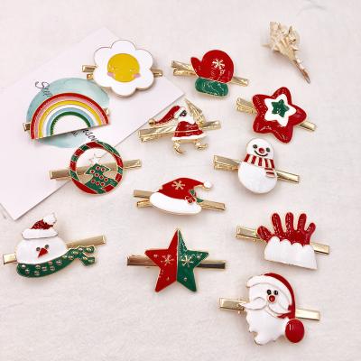 China Environmentally Friendly Alloy Hair Clip Rainbow Flower Stars Deer Santa Claus Pattern Christmas Snowflake Hair Clip for sale