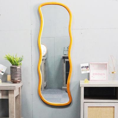 China Large Contemporary Floor Standing Mirror Full Body Wavy Shaped Dressing Mirror For Living Room for sale