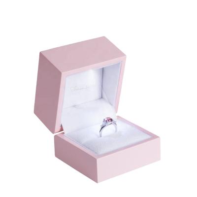 China Modern Luxury Plastic Ring Box Light Jewelry Set LED Jewelry Packaging Box for sale