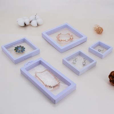 China Membrane Jewelry Bracelet Necklace Ring Window Hand Made Clear Display Box With Stand for sale