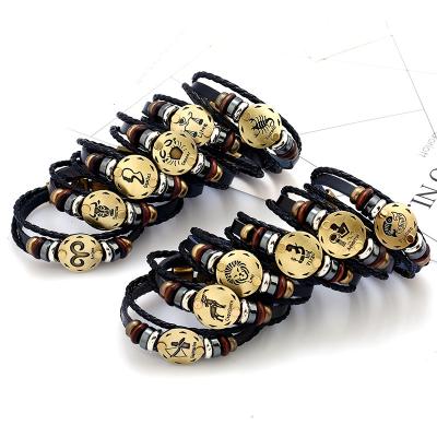 China TRENDY Fashion Braided 12 Zodiac Signs Charm Horoscope Astrology Friendship Dangle Bracelets For Women Men for sale