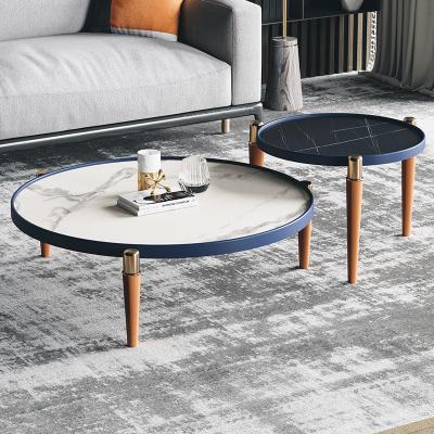 China Italian Modern Light Luxury Round Creative Hotel Combination Dish Rock Leather Coffee Table (The Other) Living Room Adjustable for sale