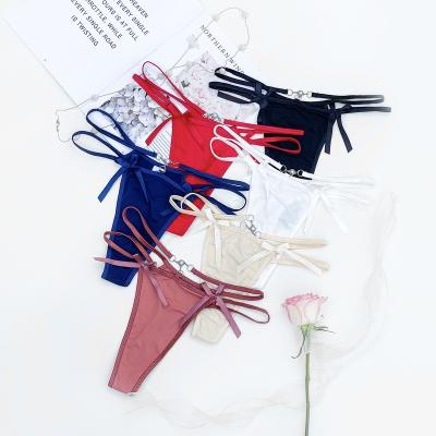 China Antibacterial sexy panties women lace up cross ladies G - string briefs solid sexy female underwear strap temptation thong for sale