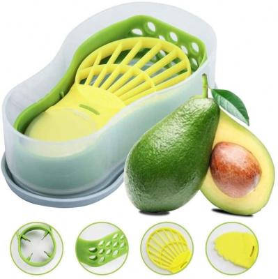 China Viable Avocado Slicer 6 in 1 Function Tool Storage Container Set for Kitchen Avocado Cutter with Green Fruit and Vegetable Chopper Peeler for sale