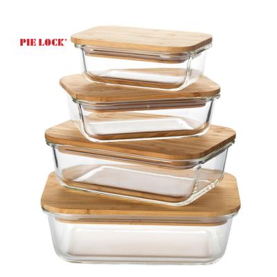 China Sustainable Glass Food Storage Container Set Oven Safe Glass Bento Bowls Bamboo Lids 4 Set Eco-Friendly Airtight Freezer for sale