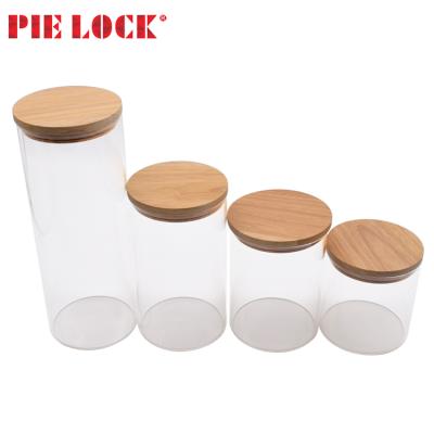 China Freshness Preservation 4 Piece Clear Glass Jars Air Tight Canister Kitchen Food Storage Container Set With Bamboo Lids for sale