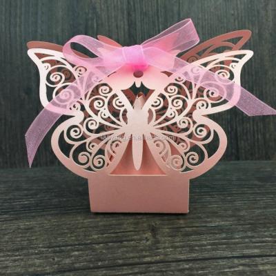 China Recyclable Laser Cut White Butterfly Wedding Box Pearl Paper Candy Box With Ribbon for sale