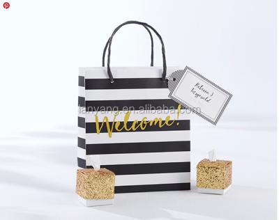 China Recyclable Wholesale Classic Home Shopping Bags Black And White Striped Paper Bags for sale