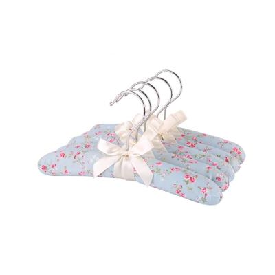 China Modern Wholesale Cheap Price Fabric Make Padded Fancy Display Hangers For Coat for sale