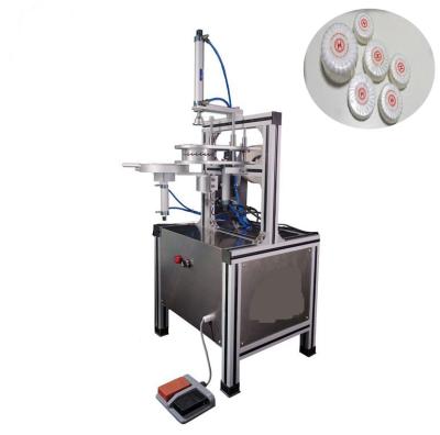 China Small Hotel Chemical Portable Toilet Soap Semi Automatic Round Fold Wrapping Packing Machine for sale