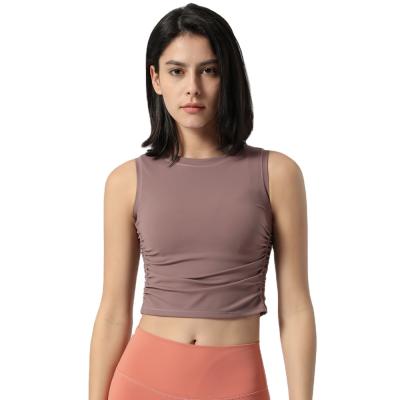 China 2021 New Breathable Breathable Sports Invest Women Yoga Sports Crop Tank Tops With Waist Pack Side Fold For Women for sale