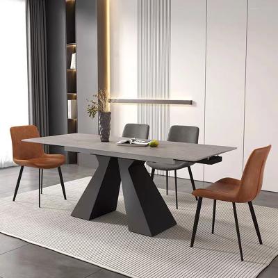 China Modern Italian Design Living Room Furniture Metal Leg Dining Table Sintered Stone Top Table Set for sale