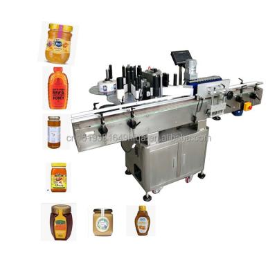 China Food Hot Sale Automatic Sticker Round and Square Bottle Labeling Machine for Round Bottle Which Label 100% Wrap Around Convenient Multifunctional for sale