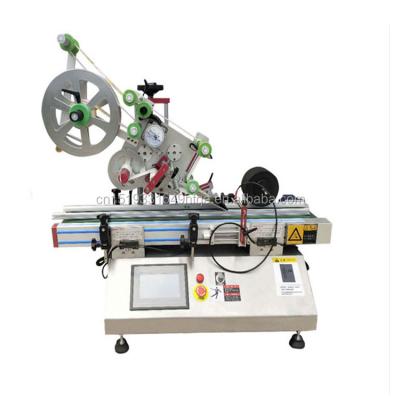 China Universal flat surface hot table top labeling machine bag sale food use labeling machine new multifunctional design 2022 practical for sale