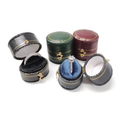 China Retro Oval Leather Filled Paper Jewelry Box Ring Box Bronzing Jewelry Pendulum Props Gift Box for sale