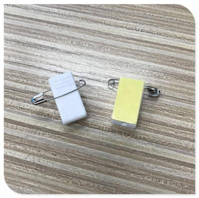 China For White Pressure Sensitive Plastic ID Card Badge Clips In Ribbed Thumb-Handle With Pin for sale