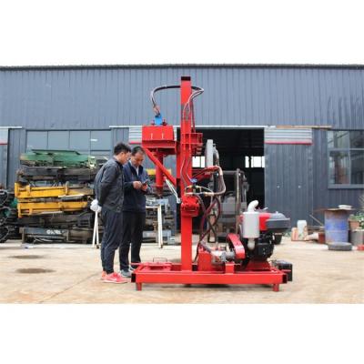 China Construction worksÂ   Competitive Price Custom Drill Trailed Tires Manual Water Well Drilling Machine for sale