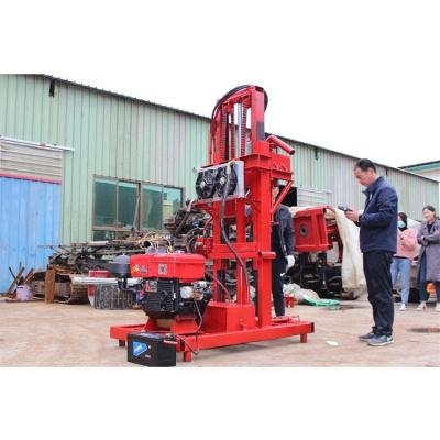 China Construction worksÂ   Factory Wholesale Price Trailed Tire Borehole Portable Bore Drilling Rig Machine for sale