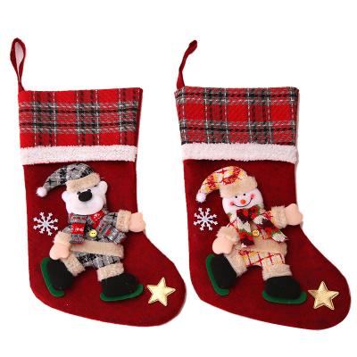 China Christmas Decoration 2021 Christmas Plaid Doll New Big Bangs Christmas Decorations White Christmas Stocking for sale