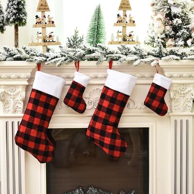 China Wholesale Christamas Decoration Christmas Decorations New Red and Black Empty Christmas Stocking Plaid Plush Christmas Socks Ornaments Canvas Gifts for sale