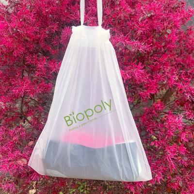 China Colorful 100% Biodegradable Disposable Tearproof Cheap Kitchen Compostable Drawstring Waste Bag On Roll for sale