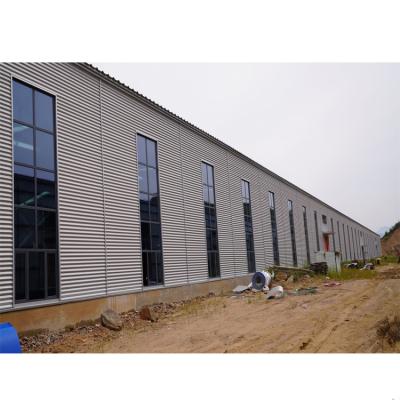 China Modern Industrial Mild Steel Construction Low Cost Steel Structure Warehouse Building Designs for sale