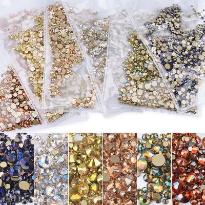 China Nail Art Decorations Mix 1440pcs/bag New Grades Glass Nail Art Decoration Stones Gold Flatback AB Nail Rhinestones DIY SS3-SS20 for sale