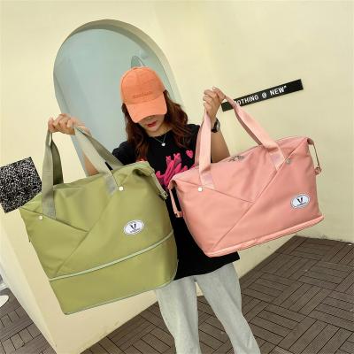 China Durable Travel Bag Women Duffle Shoulder Bag Folding Multi-functional Sports Luggage Bags For Girls Female for sale