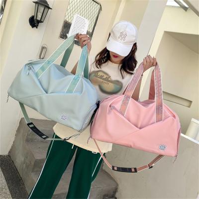 China Durable Women Gym Yoga Bag Travel Waterproof Duffle Bags Multi function Outdoor Sports Fitness Swimming Training Luggage Bags for sale