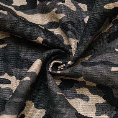 China New Pattern Paper Printing 600gsm 100% Polyester Woven Camouflage Fabrics For Clothes for sale