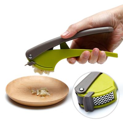 China Amazon Selling High Quality Durable Professional Kitchen Tool Durable Easy-squeeze Ergonomic ABS Handle Stainless Steel Garlic Press for sale