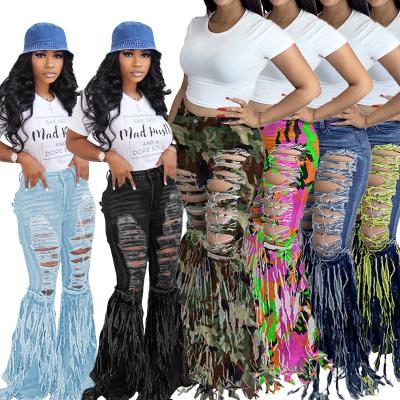 China 2021 New Mid Waist QUICK DRY Flare Jeans Pants Hollow Out Tassel Bell Bottom Pants Women's Casual Denim Pants Ripped Jeans for sale