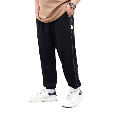 China Anti-wrinkle Long Sport Wear Waist Adjustable Construction Pants For Man for sale