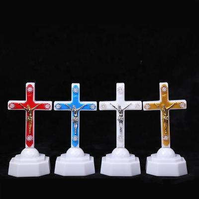 China LED Flashing Plastic Cross Europe Shenzhen Jesus Carrying Statue Light High Quality Europe Cross Religion From Manufacturer for sale