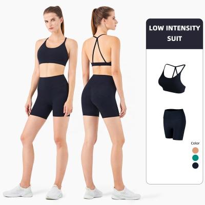 China Breathable Women Sexy Slim Strappy 2 Piece Sports Wear Sets Bra And Shorts Set High Intensity for sale