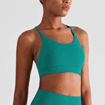 China Breathable Comfortable High End Strappy Yoga Sports Bra Top Fitness Wear For Women for sale