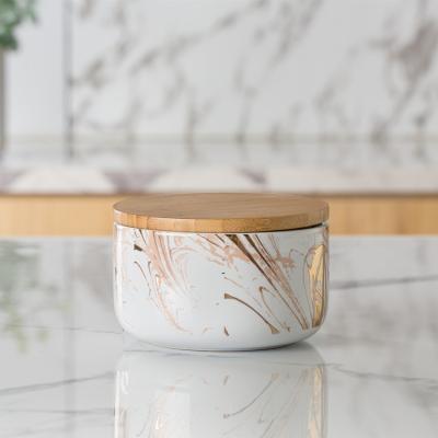 China Morden Design Luxury Unique Elegant Gold Large Capacity Decorative Kitchen Sealed Ceramic Canister Food Storage Jar for sale