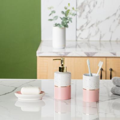 China Korea Fashion Design Cheap Sustainable Chic Pink Porcelain Custom Bathroom Set With Gold Line Decor for sale