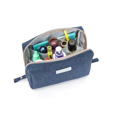 China Korean Fashion Portable Waterproof Ladies Toiletry Bag Storage Hand Fashion Travel Version Cosmetic Bag for sale