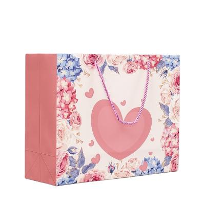 China New Design Pink Recyclable Customizable Packaging Customizable Clothing Packaging Bag White Color Stain Shoes Logo Paper Tote Bag for sale