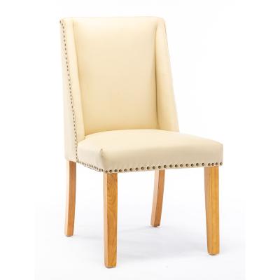 China Wood Base Classic Beige Synthetic Leather Legs Solid Wood Restaurant Dining Chair for sale