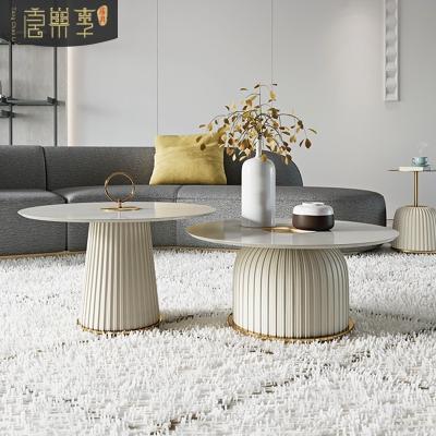 China Extendable round coffee table, light luxury, modern Italian rock panel combination, small apartment creative designer, postmodern Hong Kon for sale