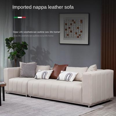 China Small Apartment Living Room Atmosphere Leather Nordic Italian Light Luxury Straight Line Economy Sofa Bed Simple Style Latex for sale