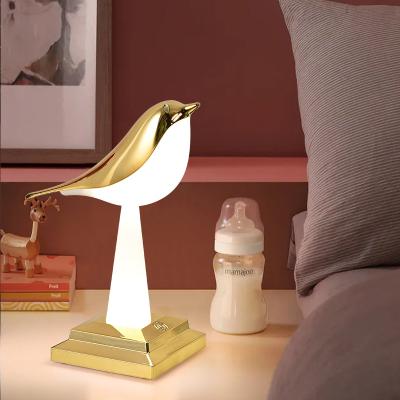 China Modern Creative Gold Light Touch Night Light Bird 2022 Atmosphere Fill Decorative Desk Lamp Table Lamp for sale