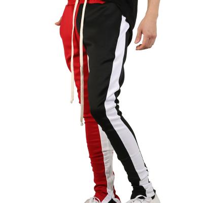 China QUICK DRY men's casual sports pants color matching hip hop fitness pants outdoor men sports pants for sale