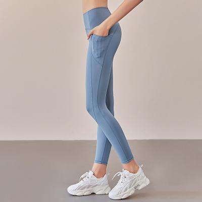 China Breathable practice with seamless gym workout fitness pocket size OEM sports women leggings crunch! crack! yoga custom made high butt wholesale for sale